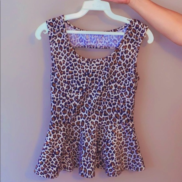 Charlotte Russe Tops - leopard print peplum top
